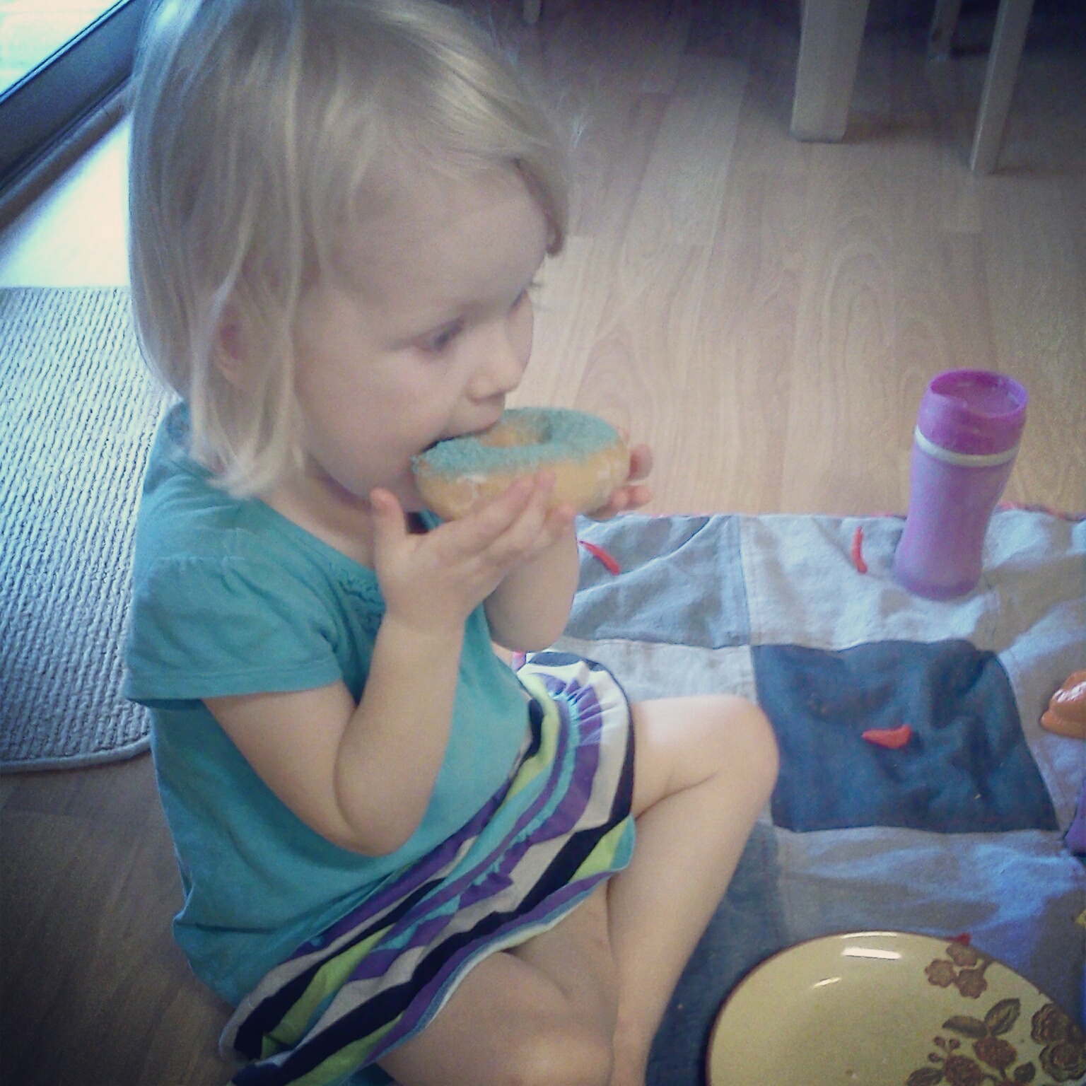 The sprinkles match Emilyʼs shirt!